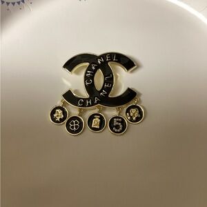 CHANEL Black and Gold Iconic Charm Brooch